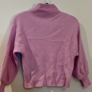 Pink knit turtleneck sweater